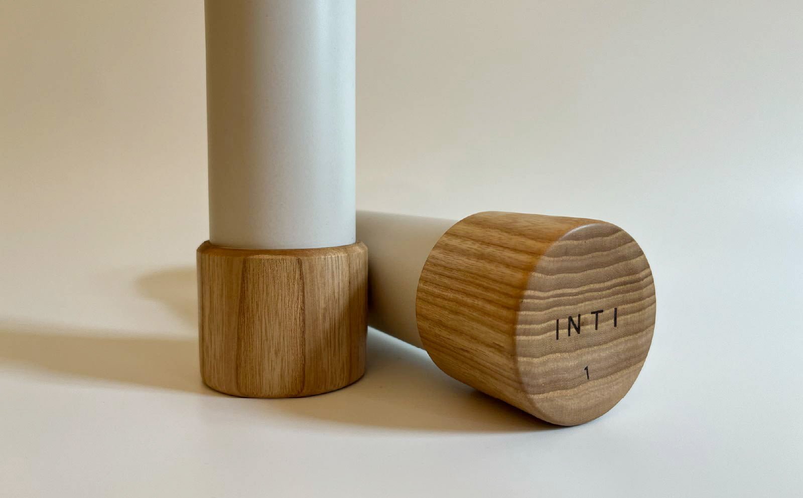 INTI 1kg Aerobics Dumbbell. Close up of Ash Wood end.